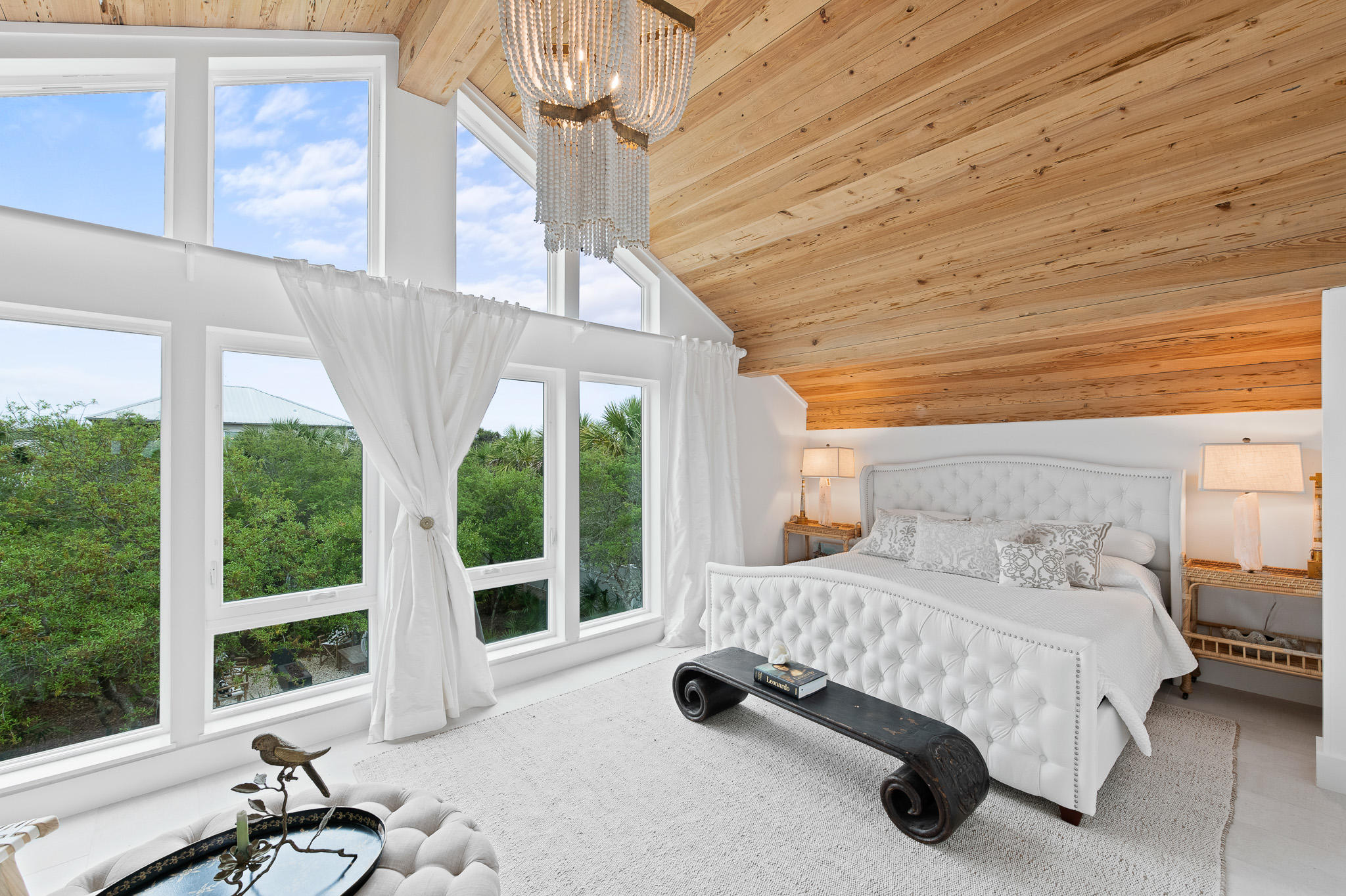 207 Sand Cliffs Drive Inlet Beach, FL 32461 - Photo 21 of 26 a bedroom with a bed couch and large window