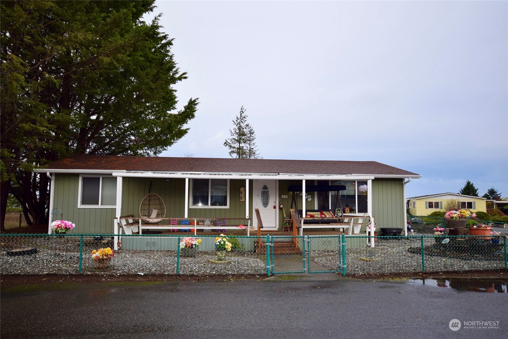 a front view of a house with porch