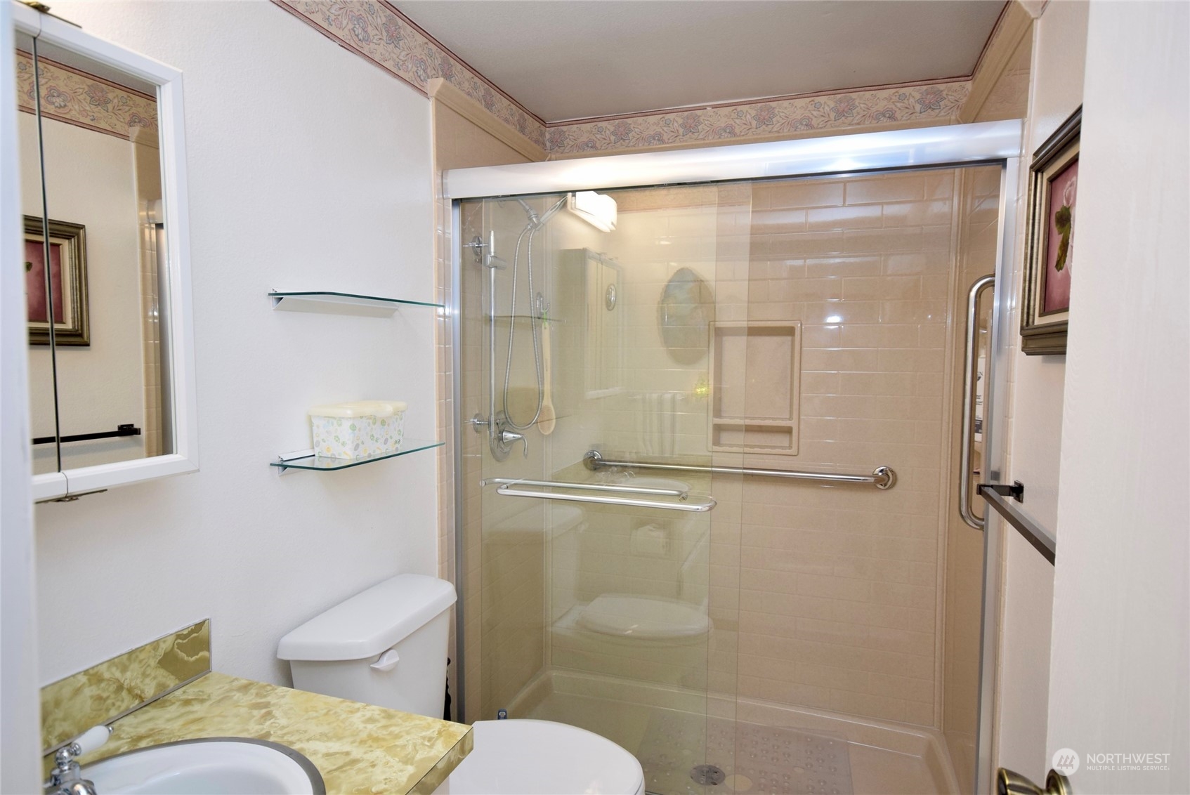 52 Juniper Mobile Estate Sequim, WA 98382 - Photo 14 of 21 a bathroom with a granite countertop sink toilet and shower