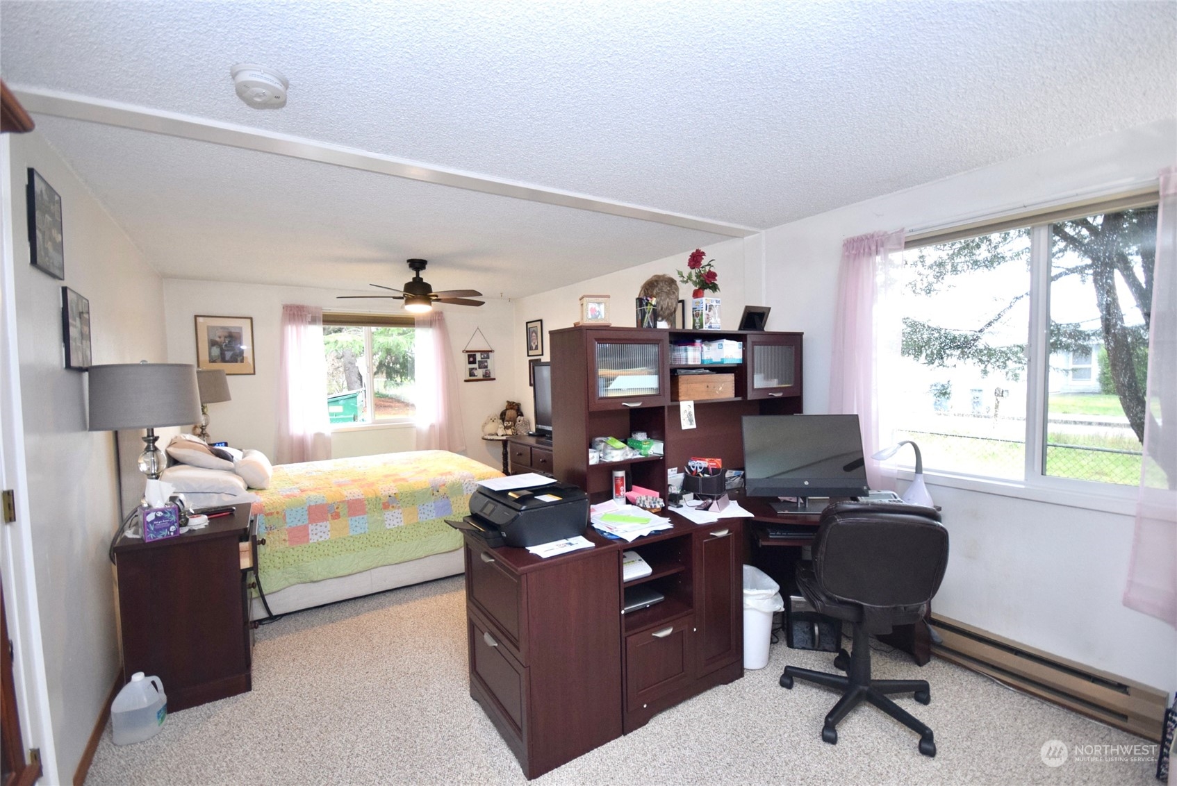 52 Juniper Mobile Estate Sequim, WA 98382 - Photo 16 of 21 a living room with furniture window and a flat screen tv