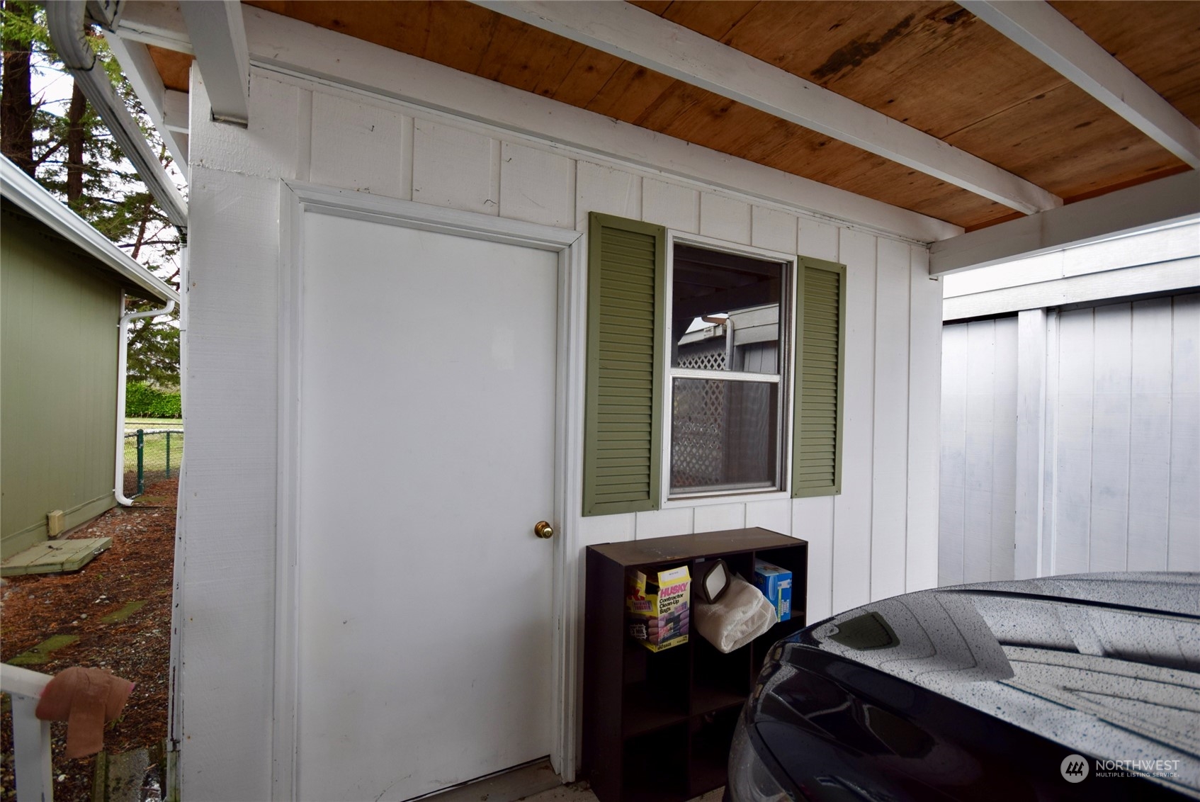 52 Juniper Mobile Estate Sequim, WA 98382 - Photo 19 of 21 a room with mirror and furniture