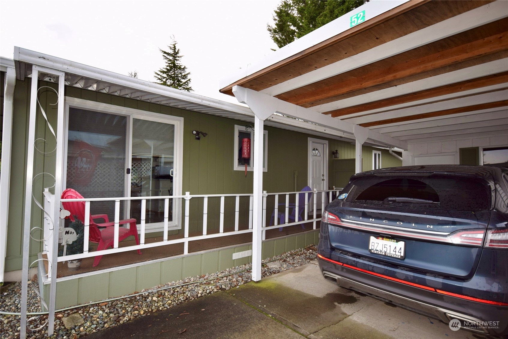 52 Juniper Mobile Estate Sequim, WA 98382 - Photo 5 of 21 a view of car parked in front of house