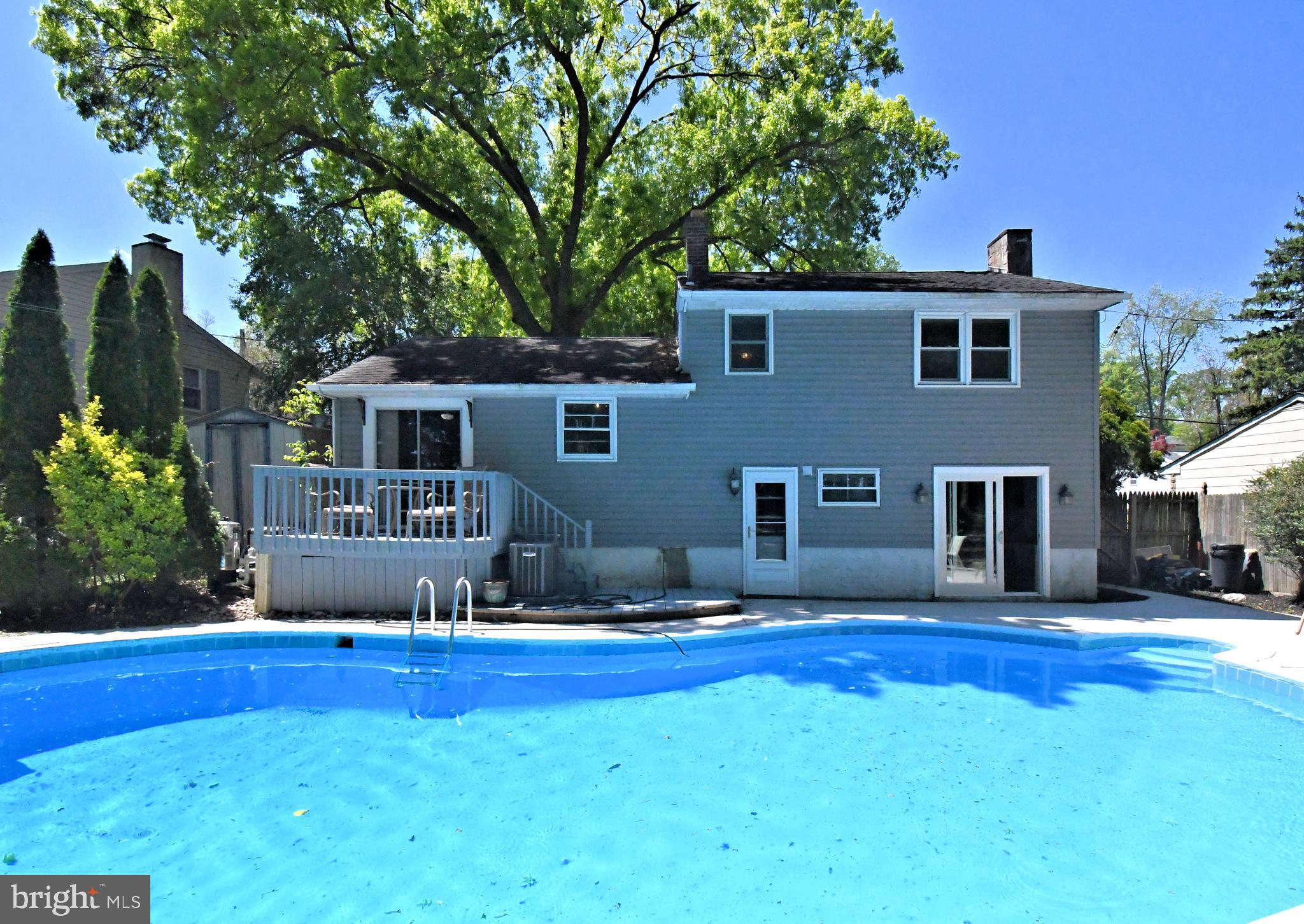 609 Mansfield Road Willow Grove, PA 19090 - Photo 53 of 68 a house view with swimming pool in front of it