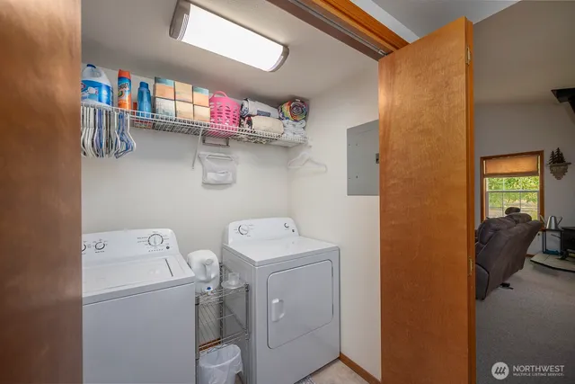 a utility room with dryer and washer