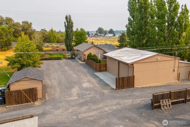 a view of a terrace with wooden fence