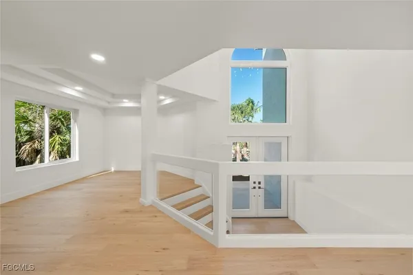 a view of workspace with furniture and a window