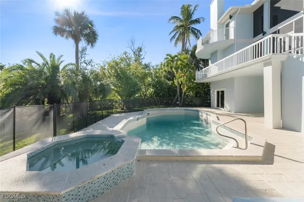 a view of a backyard with fountain