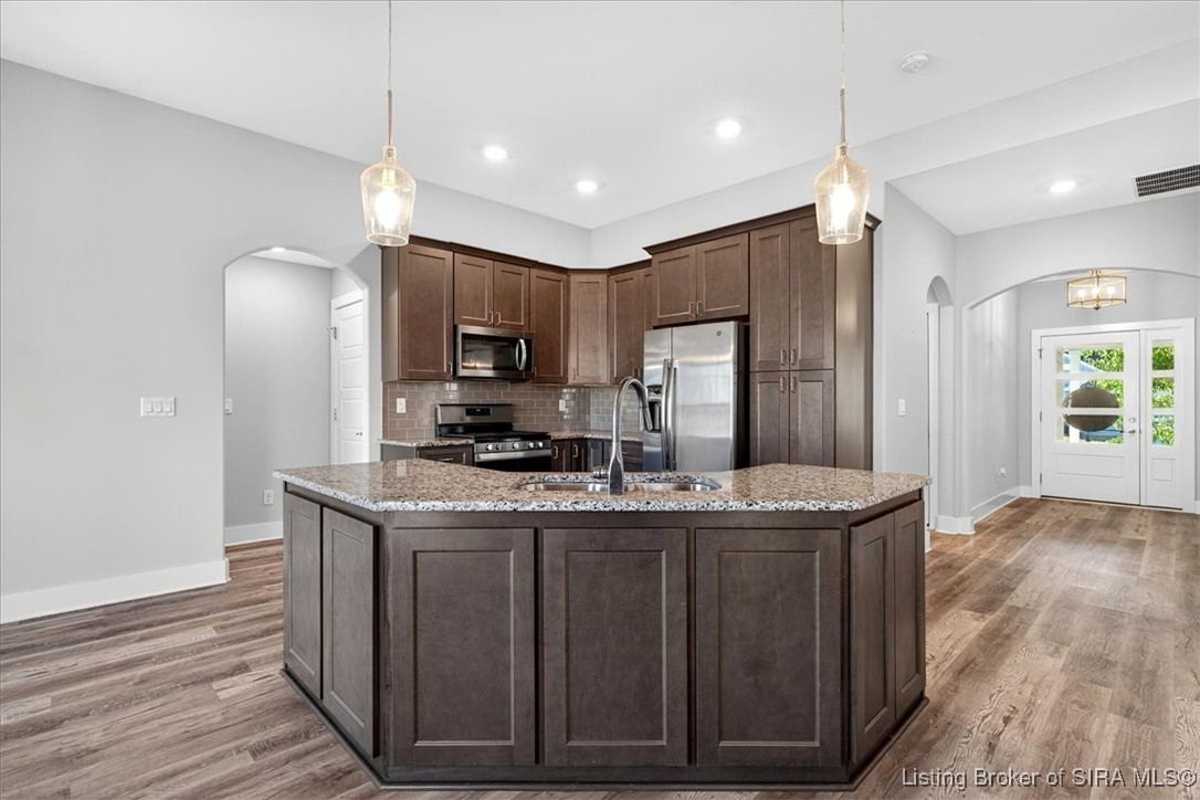7808 Linwood Circle Charlestown, IN 47111 - Photo 11 of 36 Central kitchen island is wonderful for hosting and serving