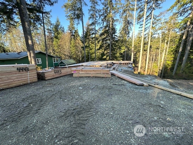821 East Olde Lyme Road Shelton, WA 98584 - Photo 26 of 33 a view of yard with tree and wooden fence