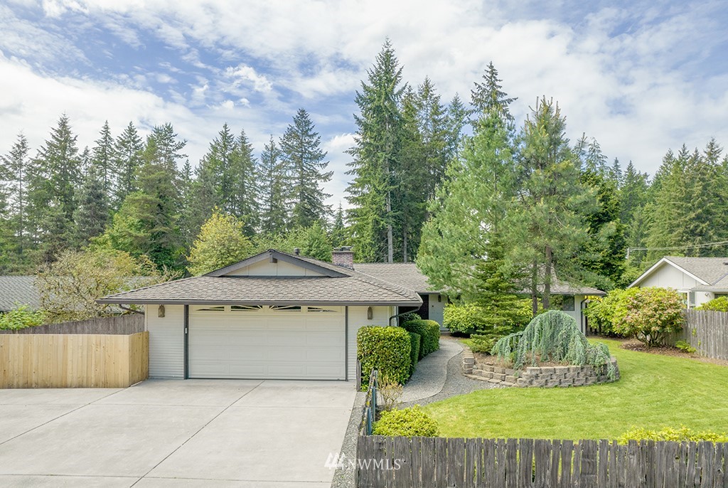 14413 157th Place Southeast Renton, WA 98059 - Photo 1 of 29 a view of a house with a yard and sitting area