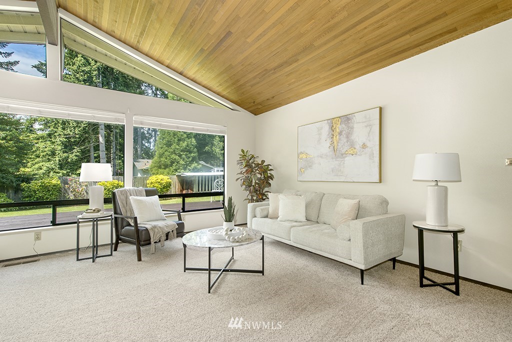 14413 157th Place Southeast Renton, WA 98059 - Photo 13 of 29 a living room with furniture and a large window