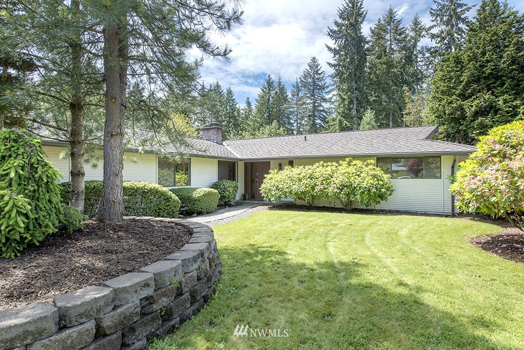14413 157th Place Southeast Renton, WA 98059 - Photo 2 of 29 a front view of a house with a yard