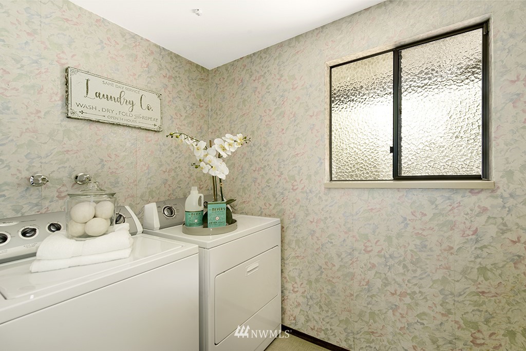 14413 157th Place Southeast Renton, WA 98059 - Photo 22 of 29 a bathroom with a sink and a mirror