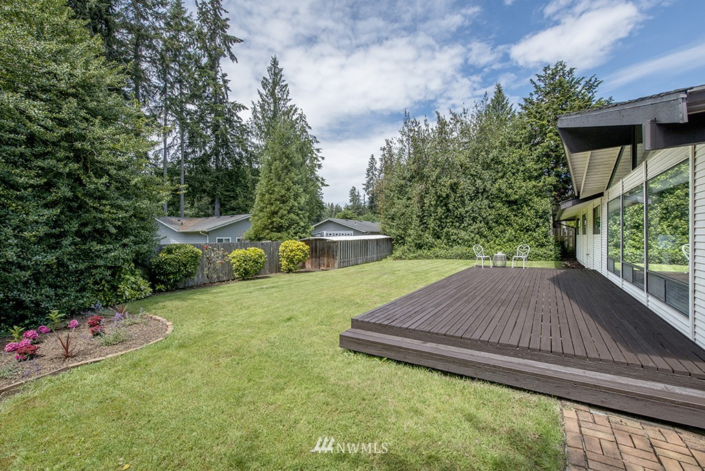 14413 157th Place Southeast Renton, WA 98059 - Photo 26 of 29 a view of backyard with plants and outdoor seating