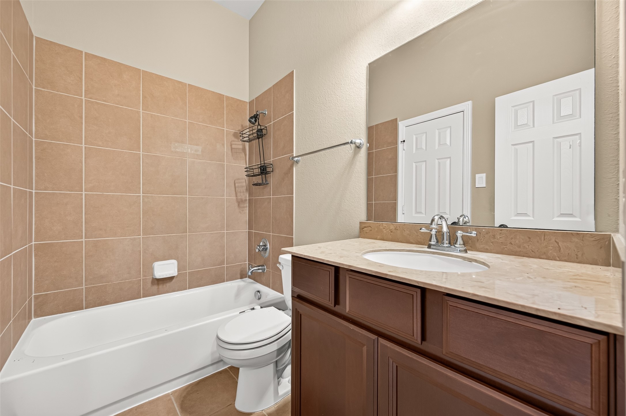 4314 Kent Ranch Court Katy, TX 77494 - Photo 35 of 49 Full ensuite bath with tub/shower combo, tile surround and espresso vanity.