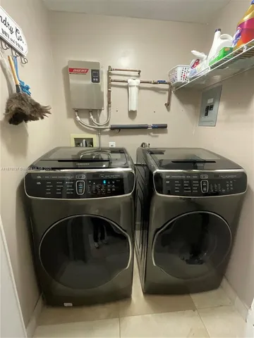 a view of swimming pool with patio