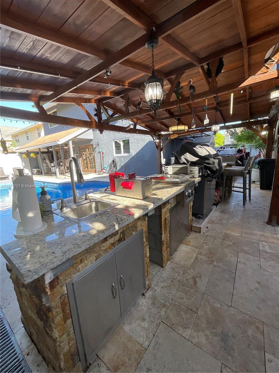 9710 Southwest 13th Street, Unit 9710 Pembroke Pines, FL 33025 - Photo 17 of 43 a view of a storage & utility room