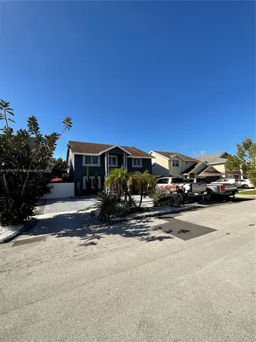 a car parked in front of a house