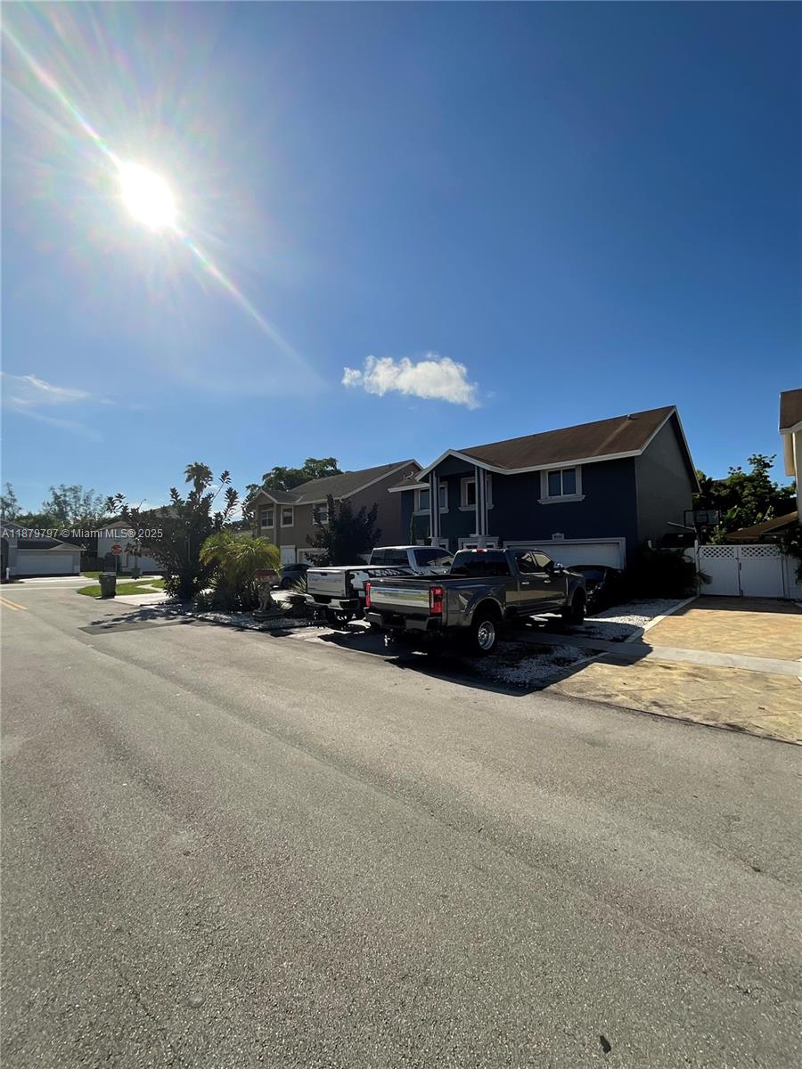 9710 Southwest 13th Street, Unit 9710 Pembroke Pines, FL 33025 - Photo 40 of 43 a view of a street