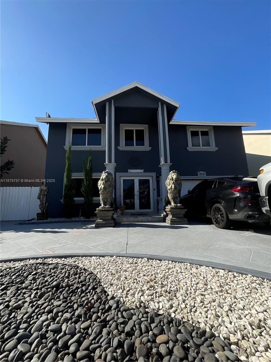 9710 Southwest 13th Street, Unit 9710 Pembroke Pines, FL 33025 - Photo 43 of 43 a view of a house with a barbeque