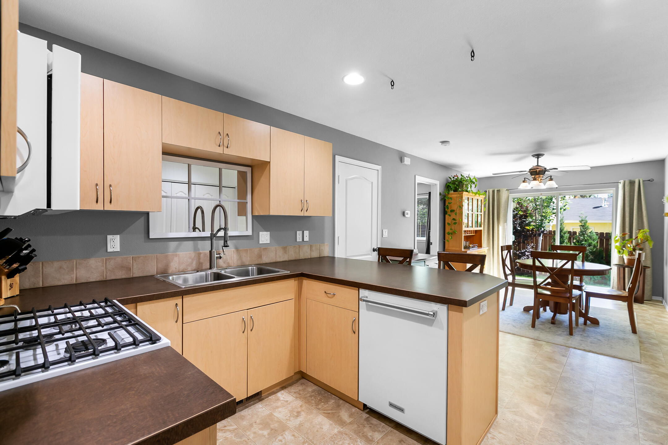 21363 Pecoraro Loop Bend, OR 97701 - Photo 6 of 15 a kitchen with a sink stove and cabinets