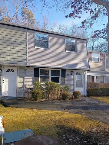 a front view of a house with swimming pool