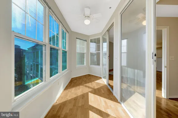 a view of a balcony with furniture