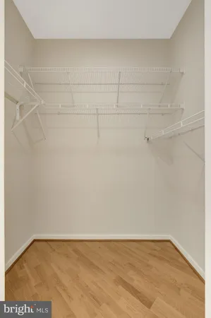 a view of a street with houses on both side