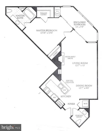 a view of a kitchen with furniture and a refrigerator