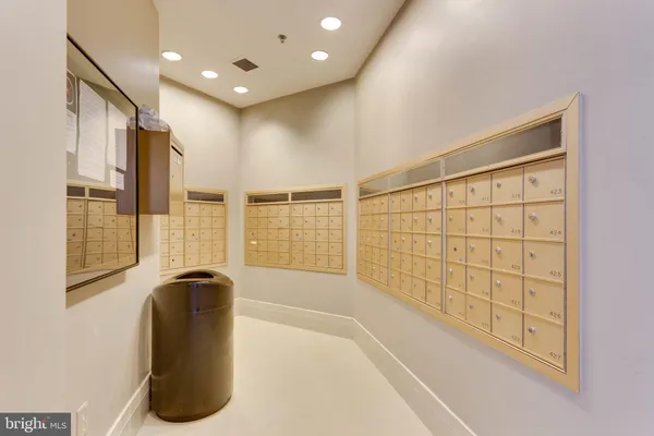 a room with pool table and windows
