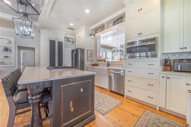a bedroom with a bed and a view of bathroom