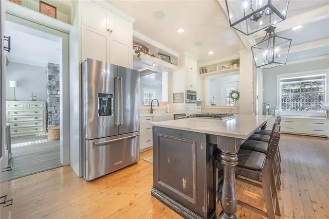 a bedroom with a large bed and a tv