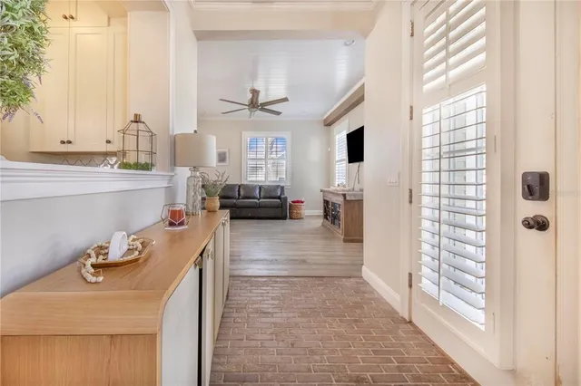 a view of backyard with swimming pool and outdoor seating