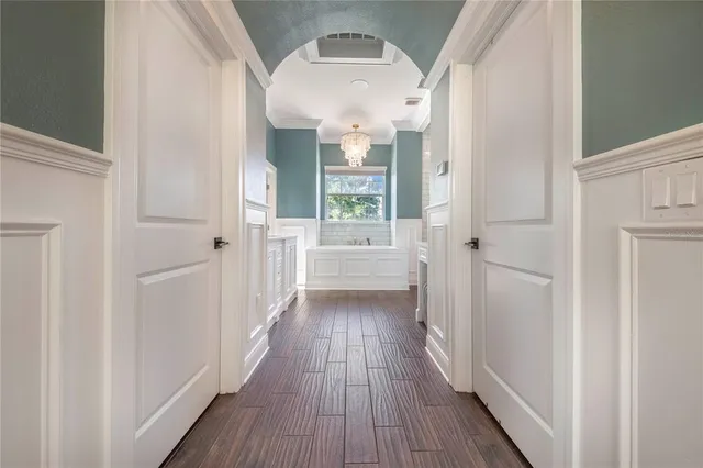 a view of a balcony with table and chairs