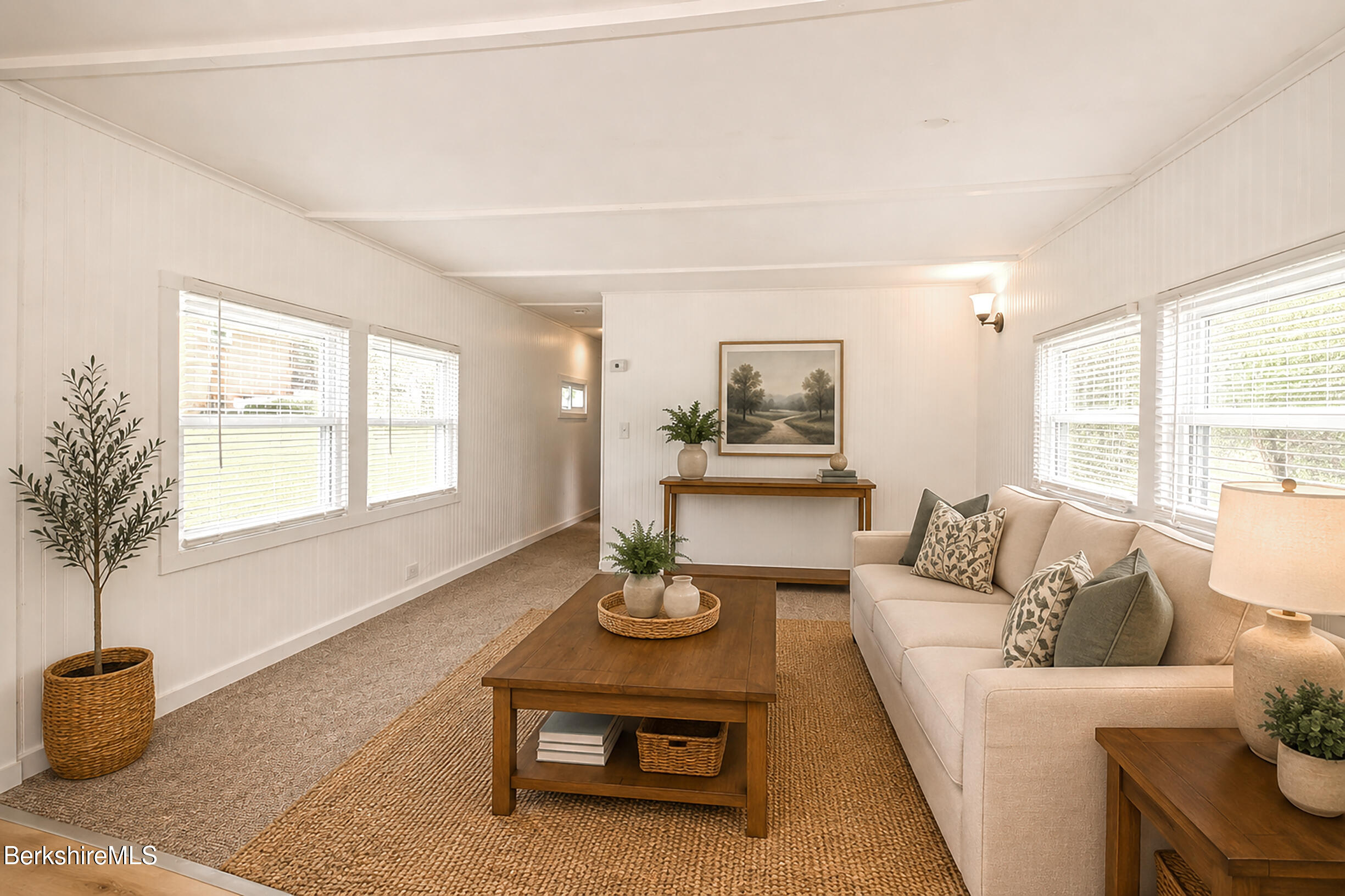 405 Pittsfield Road, Unit LOT F2 Lenox, MA 01240 - Photo 19 of 23 a living room with furniture and a potted plant