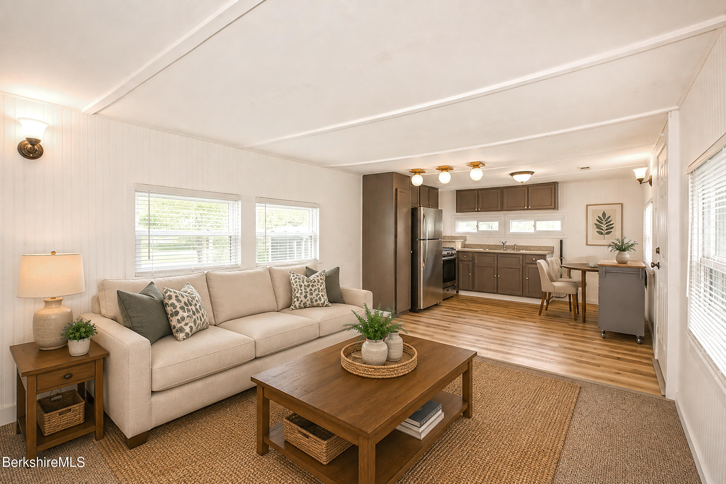 405 Pittsfield Road, Unit LOT F2 Lenox, MA 01240 - Photo 20 of 23 a living room with furniture and a table