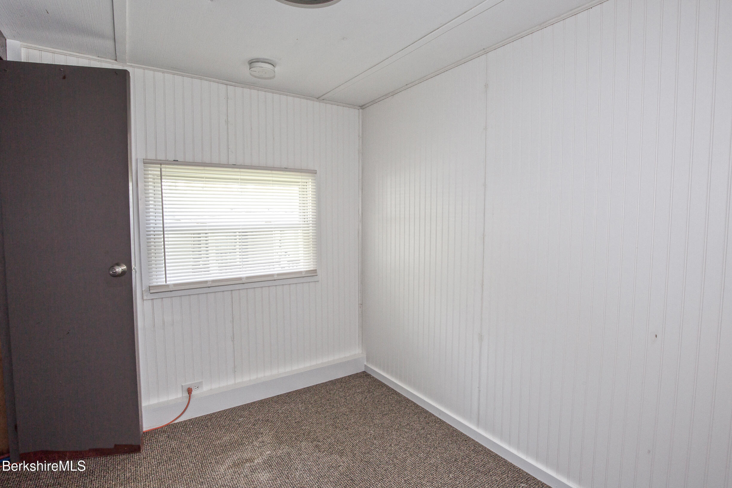 405 Pittsfield Road, Unit LOT F2 Lenox, MA 01240 - Photo 8 of 23 a view of an empty room with a window