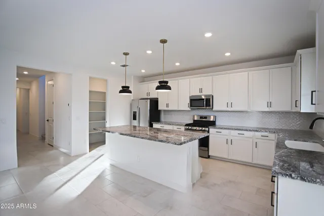 a view of an empty room and window in a room