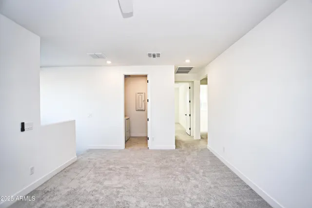 a bathroom with a double vanity sink and mirror
