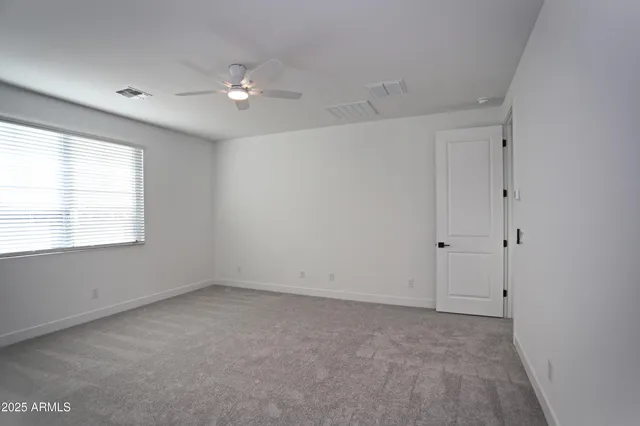 a bathroom with a sink toilet and mirror