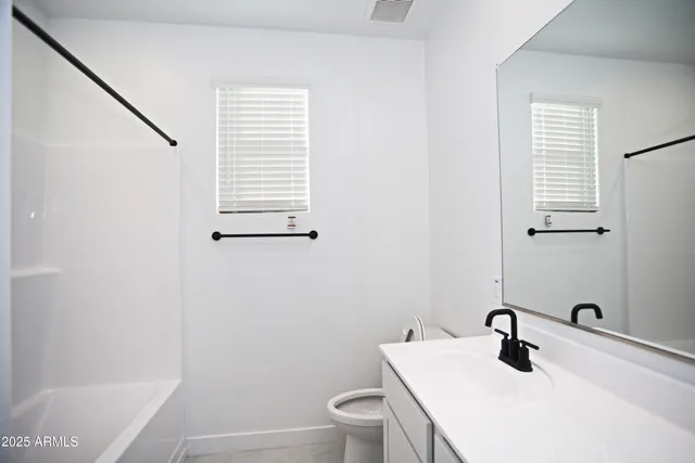 a view of a lake with a garden and lake view