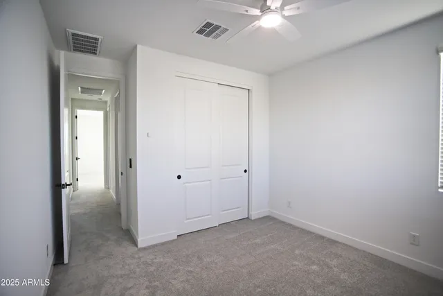 a view of a swimming pool and a yard