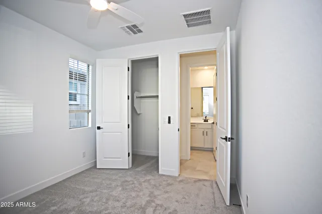 a bathroom with a bathtub and a toilet