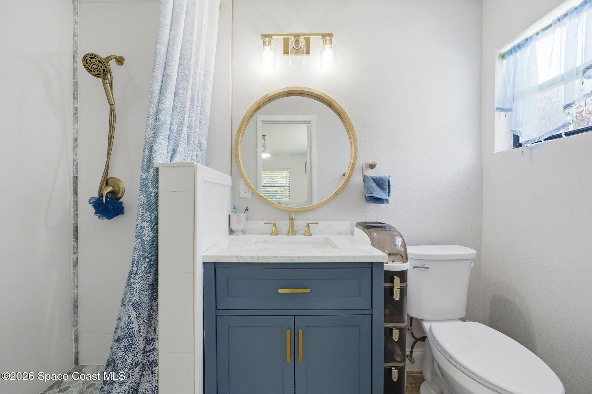 2440 Warwick Road Melbourne, FL 32935 - Photo 18 of 31 en suite bathroom