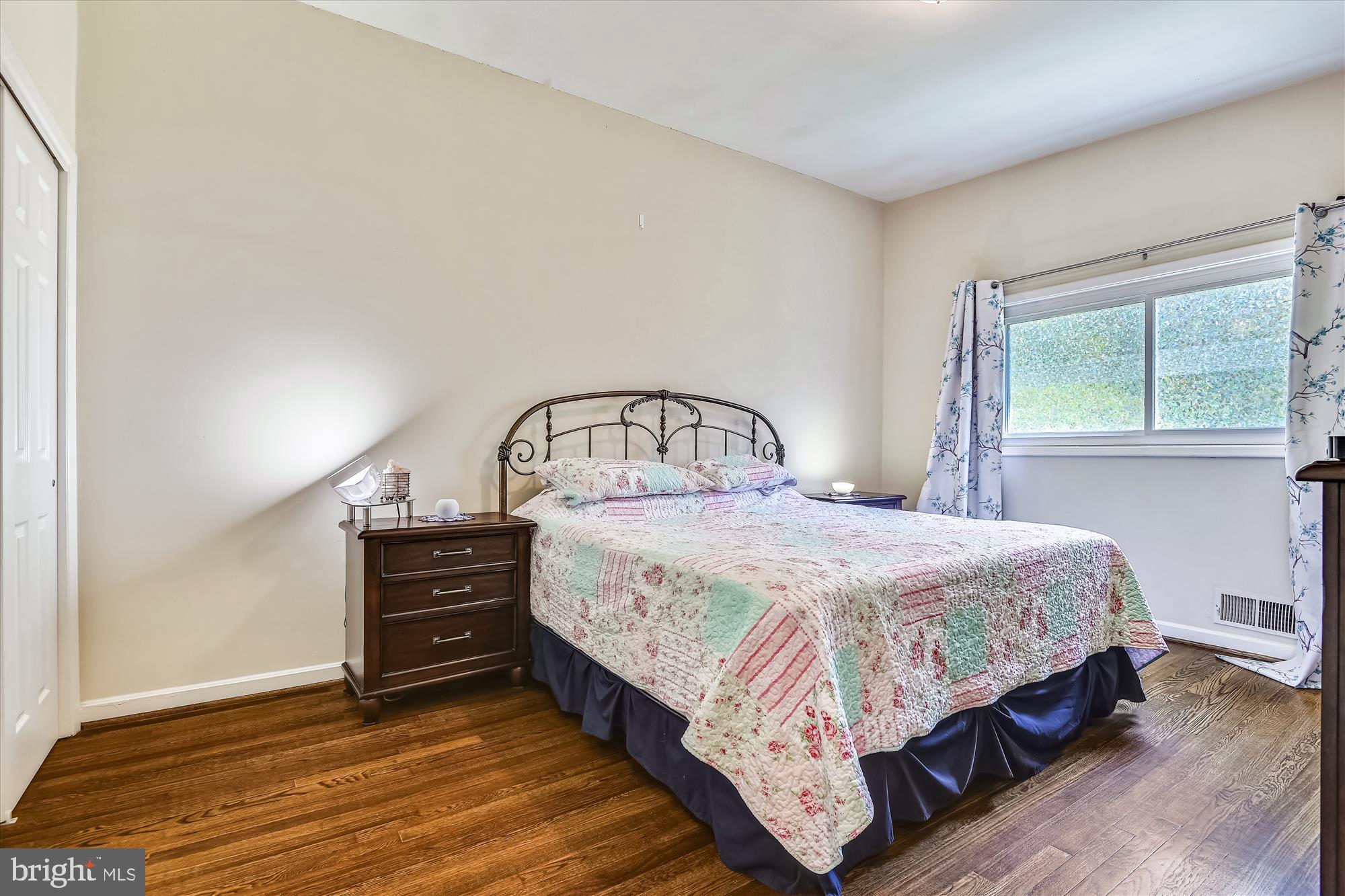 6805 Barnett Road Baltimore, MD 21239 - Photo 15 of 37 Primary bedroom with nice closet and sunny windows