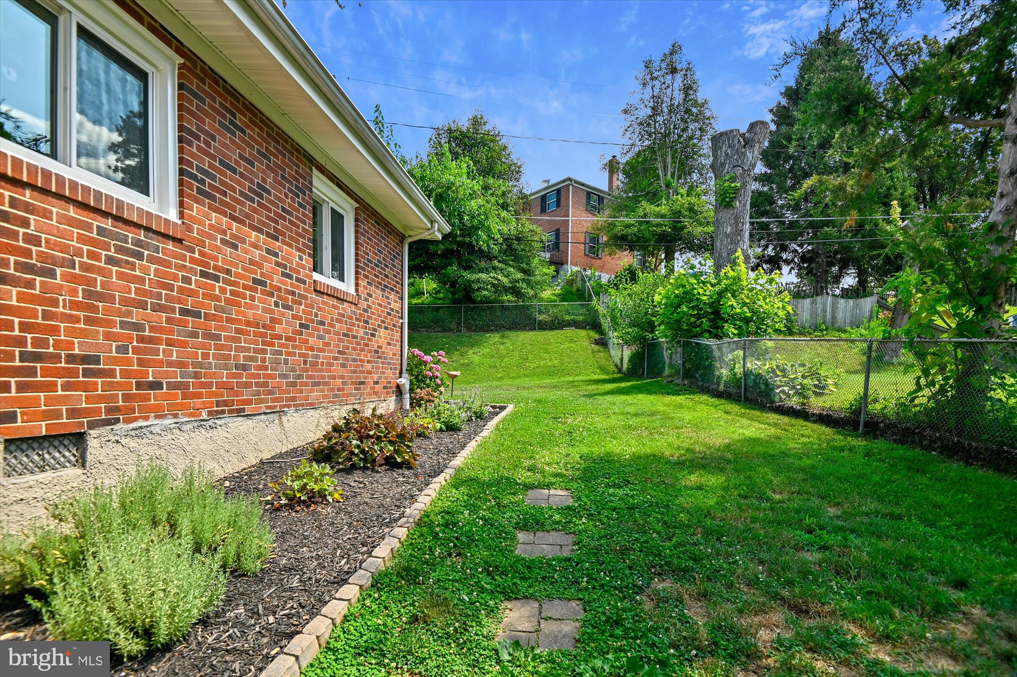 6805 Barnett Road Baltimore, MD 21239 - Photo 32 of 37 Lovely flower bed beside the house