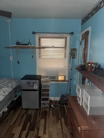 a workspace with furniture and a window