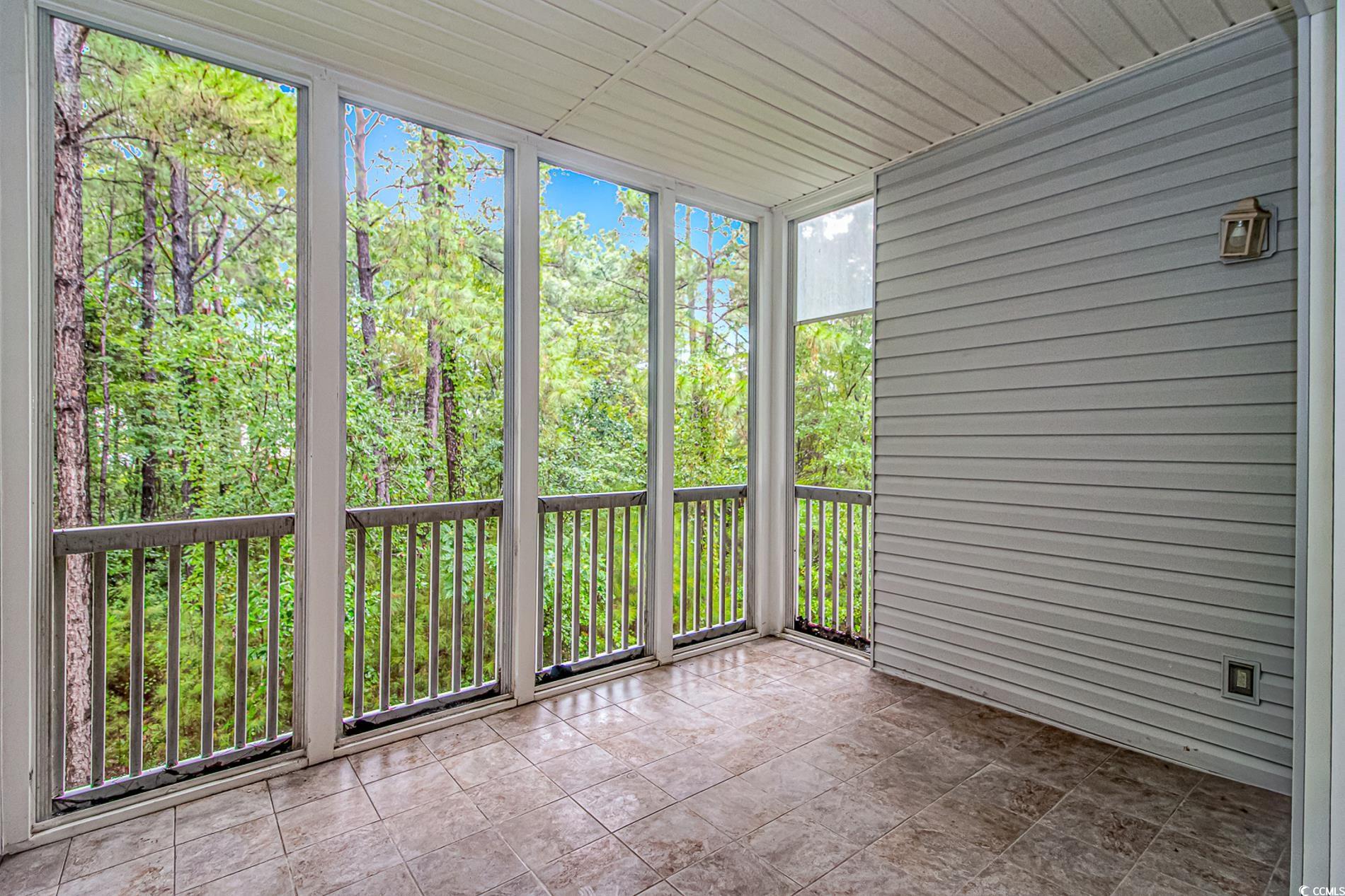 4814 Innisbrook Court, Unit 407 Myrtle Beach, SC 29579 - Photo 13 of 31 View of unfurnished sunroom