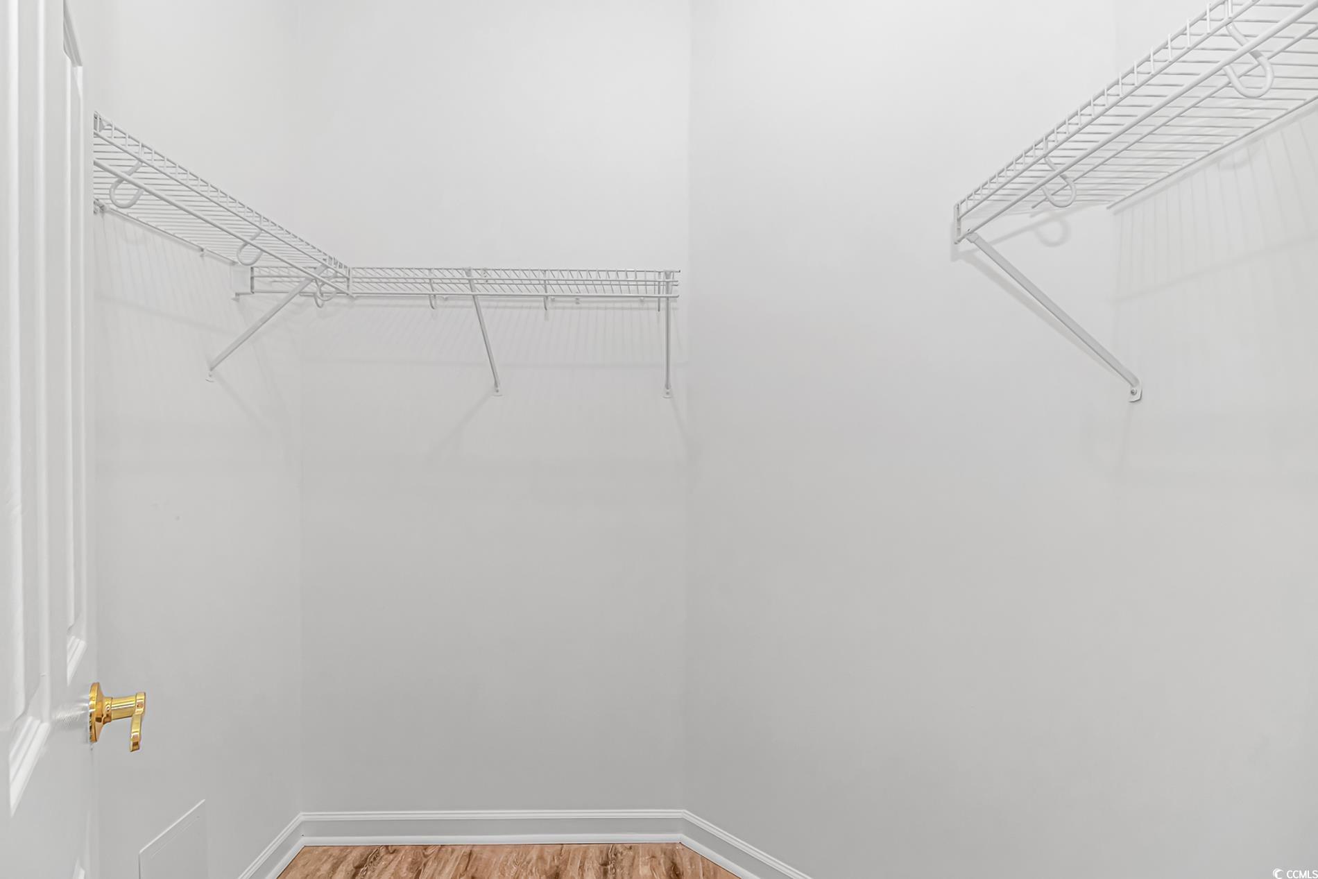 4814 Innisbrook Court, Unit 407 Myrtle Beach, SC 29579 - Photo 16 of 31 Spacious closet with light wood finished floors