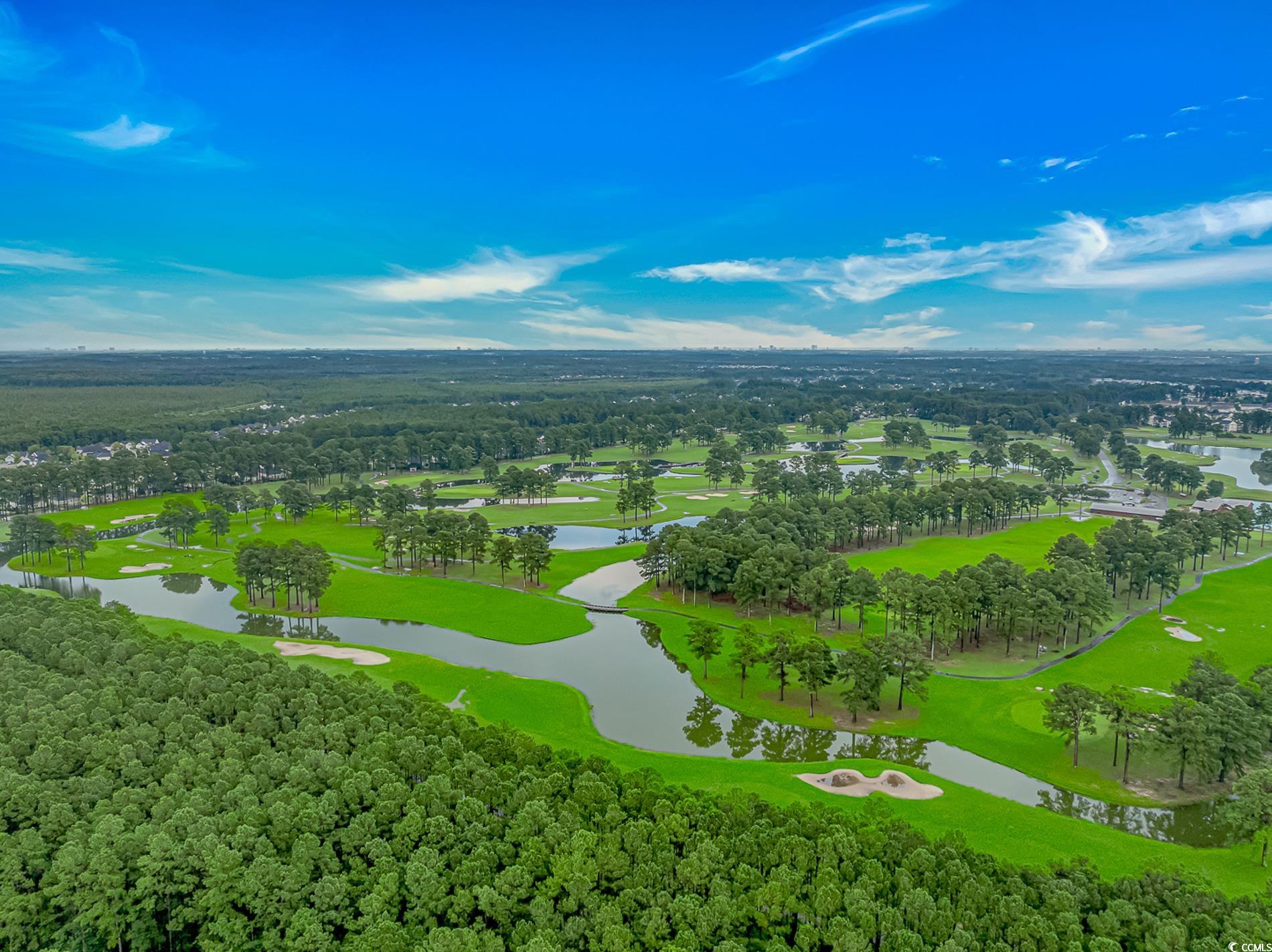 4814 Innisbrook Court, Unit 407 Myrtle Beach, SC 29579 - Photo 27 of 31 Aerial view of a nearby body of water and a local golf course